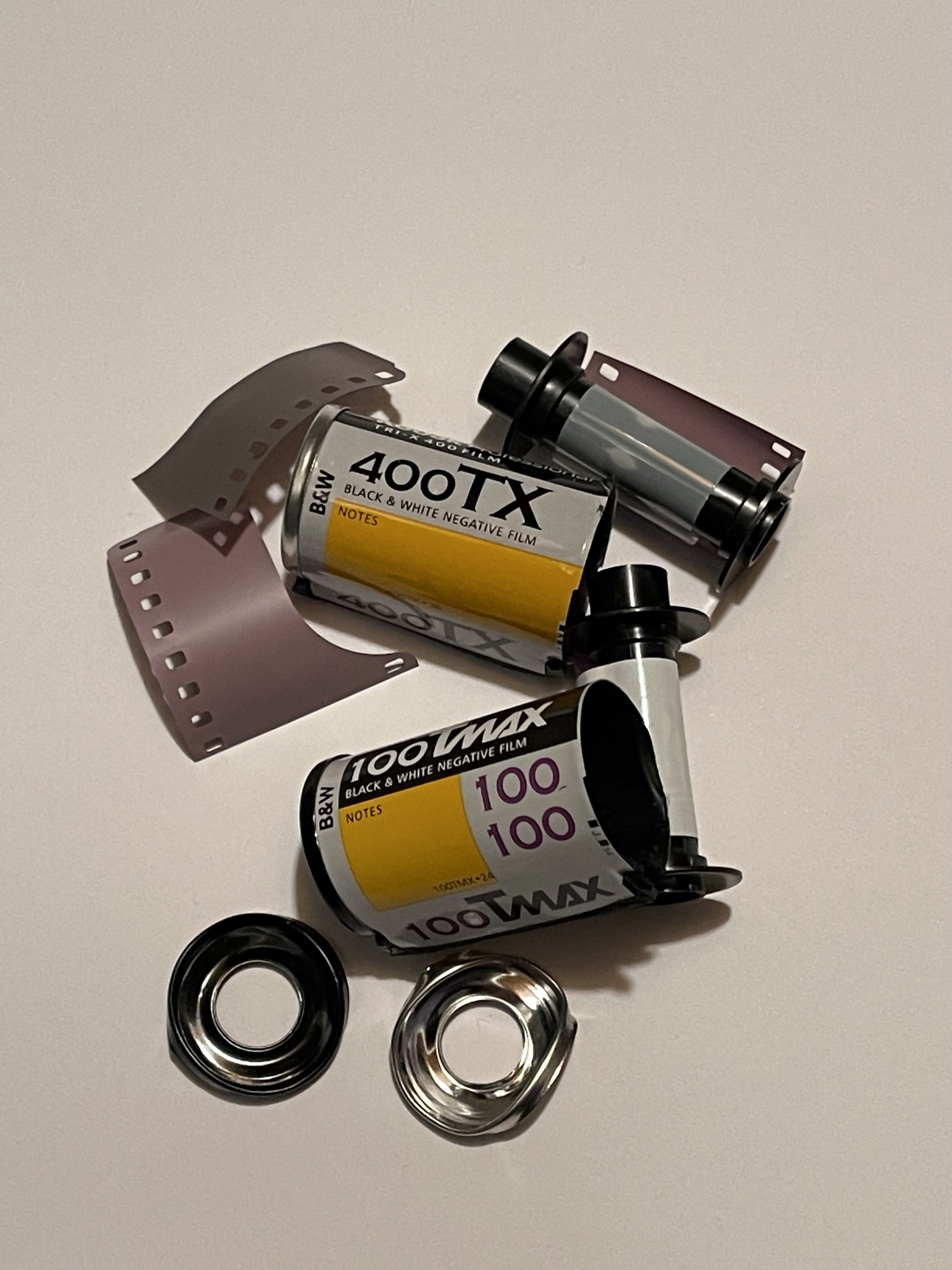Two canisters of Kodak Tri-X 400 broken open
