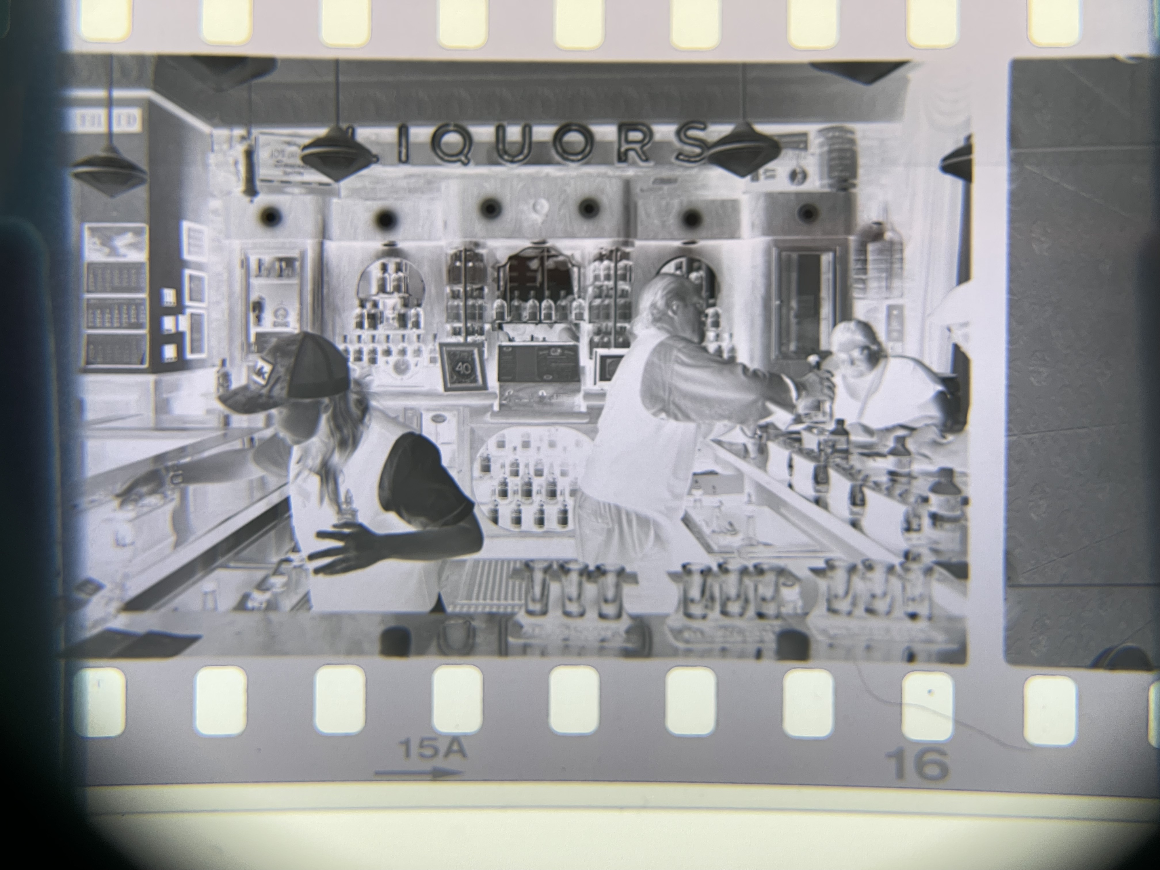A film negative showing two bar keeps