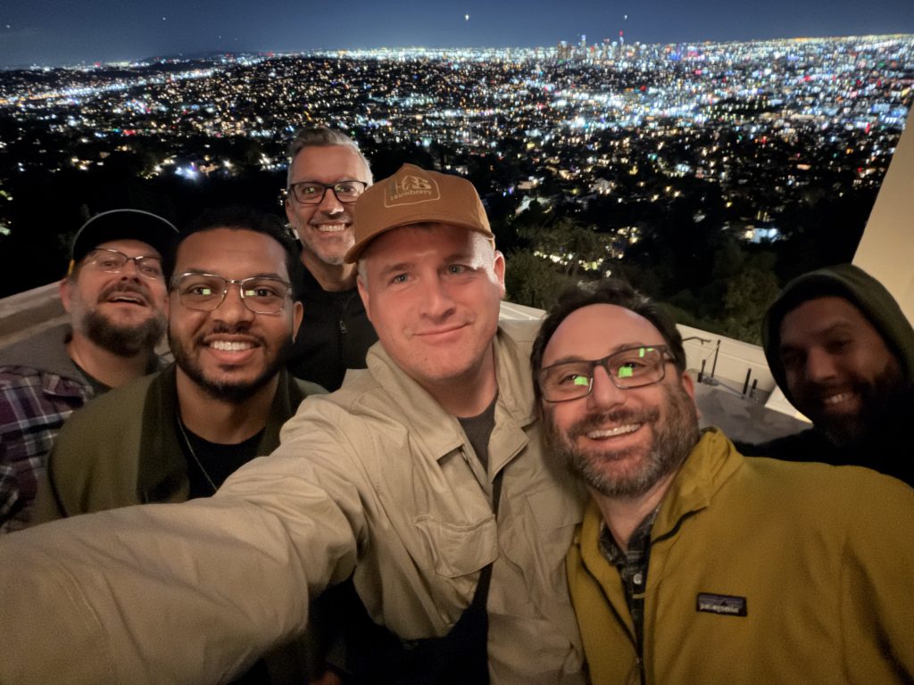 Me with friends and team members at night overlooking LA from Griffith Observatory.